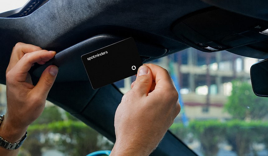 A Spotminders card in a car