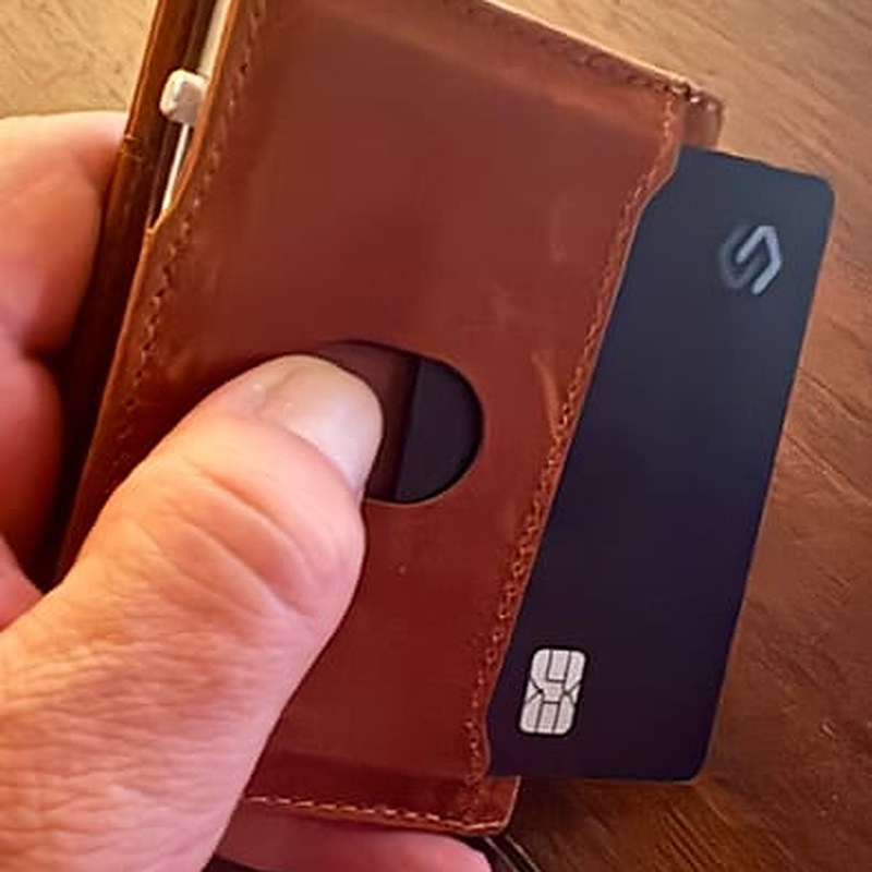 A Spotminders card flat inside a wallet